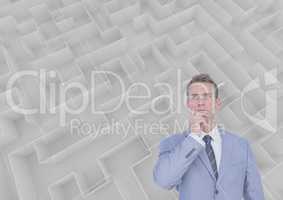 Man thinking behind a 3d maze