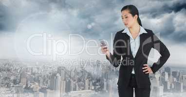 businesswoman on phone in cityscape