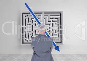 Man looking to a maze with an arrow 3d