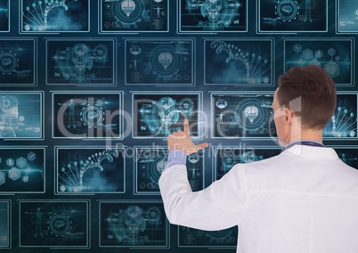 Man doctor interacting with 3d medical interfaces