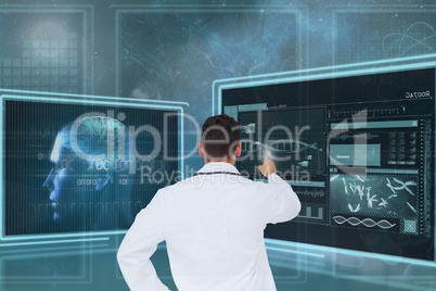 Man doctor interacting with medical interfaces 3sd]