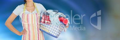 Cleaner holding laundry basket with bright background