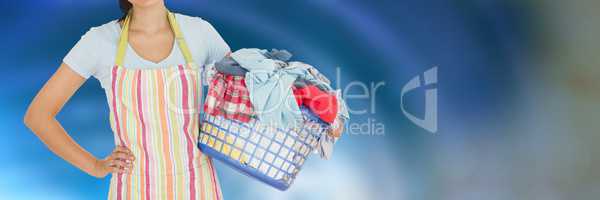 Cleaner holding laundry basket with bright background