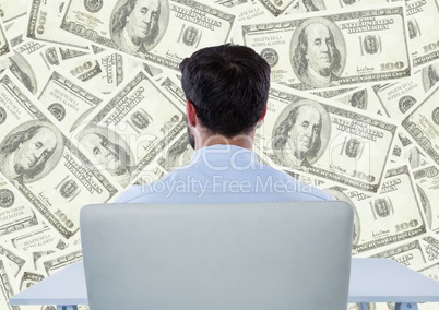 Back of business man in chair looking at money backdrop
