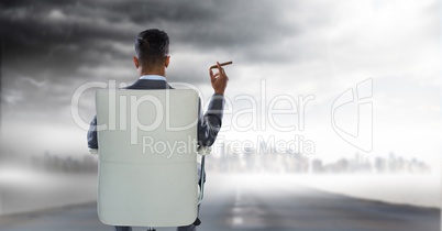 businessman with cigar in seat in cityscape