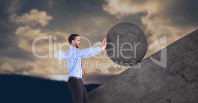 Man pushing 3D rolling round rock