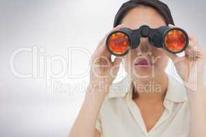 Woman looking through binoculars against white background 3d