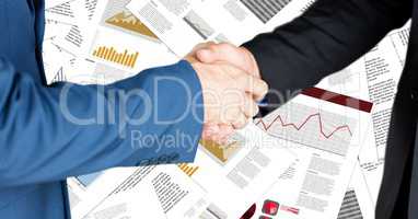 Business handshake against document backdrop