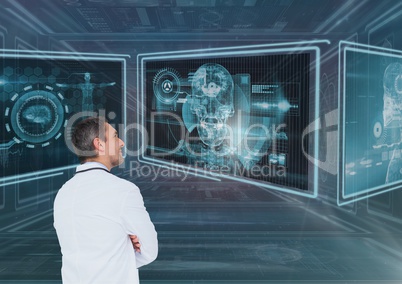 Man doctor looking at 3d medical interfaces