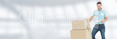 Delivery Courier with boxes in front of blurred background and copy space