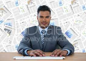 Man at desk against document backdrop