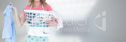 Cleaner with laundry basket and bright background