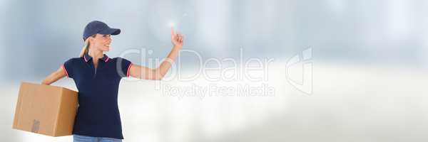 Delivery Courier woman with box in front of blurred background and copy space