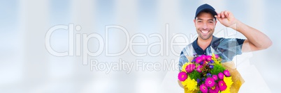 Delivery Courier holding flowers in front of blurred copy space background