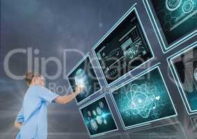 Woman doctor interacting with 3d medical interfaces