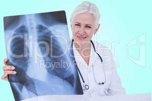 Composite 3d image of portrait of smiling female doctor examining chest x-ray