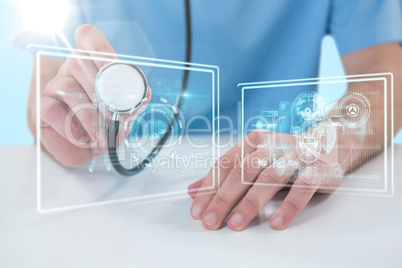 Composite 3d image of midsection of surgeon holding stethoscope