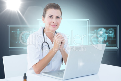 Composite 3d image of confident female doctor with laptop on table