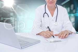 Composite 3d image of midsection of female docotor writing prescription at desk