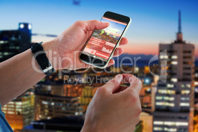 Composite 3d image of close-up of man holding mobile phone