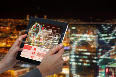 Composite 3d image of cropped image of businesswoman holding digital tablet