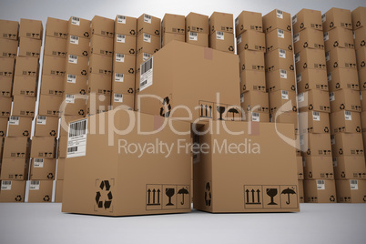 Composite image of pile of brown cardboard boxes