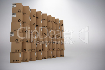 Composite image of brown packed cardboard boxes