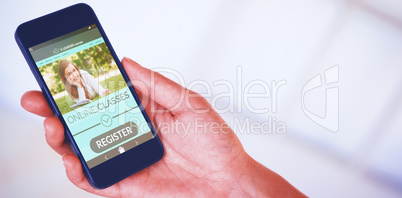 Composite 3d image of womans hand holding black smartphone