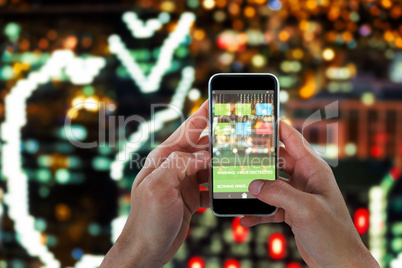 Composite 3d image of close-up of man holding smart phone