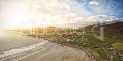 Scenic view of landscape by sea