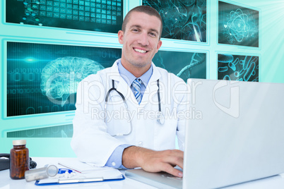 Composite 3d image of portrait of smiling businessman using laptop