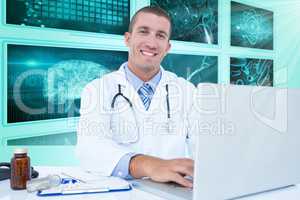 Composite 3d image of portrait of smiling businessman using laptop