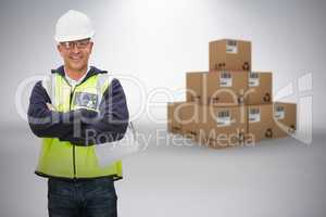 Composite 3d image of worker wearing hard hat in warehouse