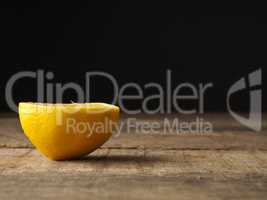 Organic lemon fruit on wood