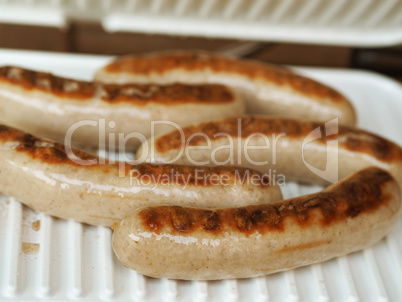 Tasty sausages on an electric grill