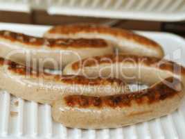 Tasty sausages on an electric grill