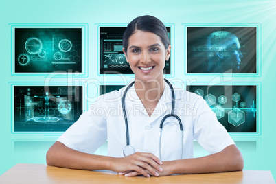 Composite 3d image of portrait of smiling female doctor sitting at desk