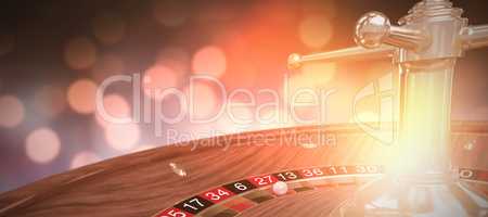 Composite 3d image of digital image of wooden roulette wheel