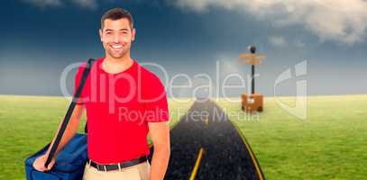 Composite image of pizza delivery man holding bag