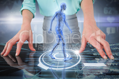 Composite 3d image of midsection of businesswoman using digital screen