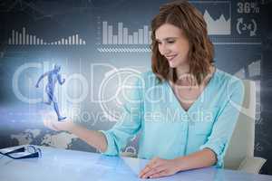 Composite 3d image of smiling businesswoman sitting at desk and using digital screen