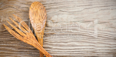 Wooden spoon and fork on table