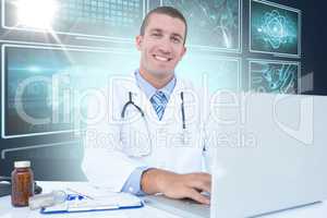Composite 3d image of portrait of smiling businessman using laptop