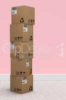 Composite image of stack of cardboard boxes on white background