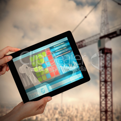 Composite 3d image of hands holding digital tablet against white background