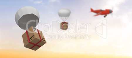 Composite image of graphic image of 3d parachute carrying cardboard box
