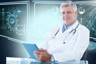 Composite 3d image of portrait of confident male doctor using digital tablet