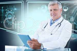 Composite 3d image of portrait of confident male doctor using digital tablet