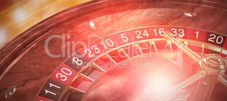 Composite image of high angle close up of 3d wooden roulette wheel