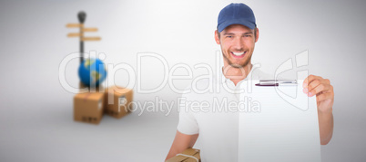 Composite image of happy delivery man holding cardboard box and clipboard
